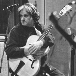 Bob Klose 1960s playing guitar in later life