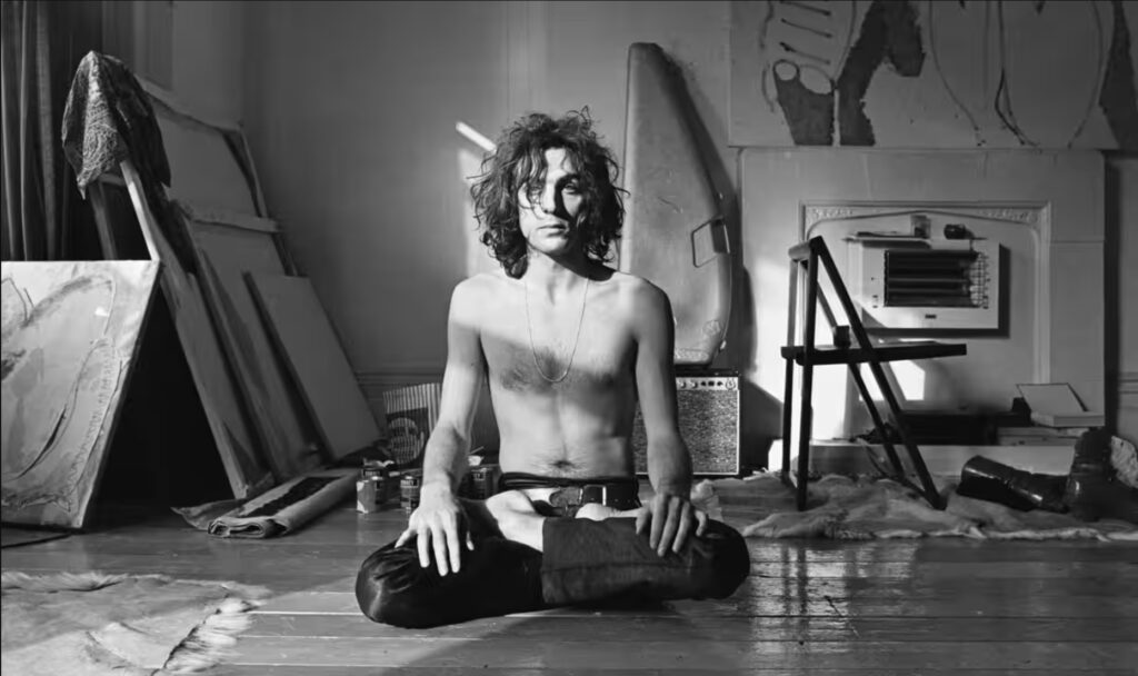 Syd Barrett with his Paintings