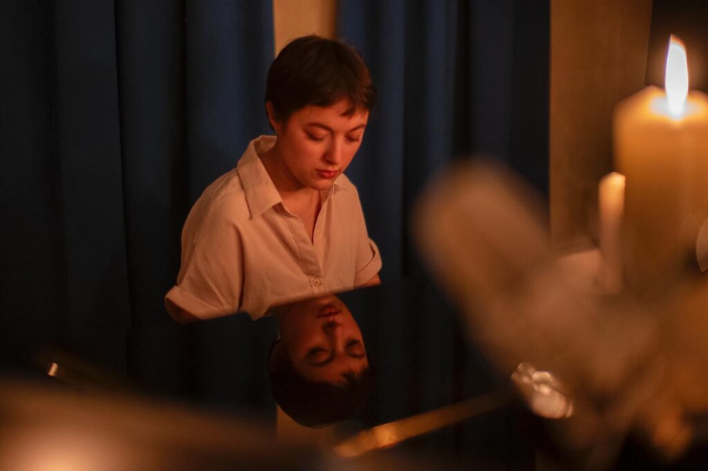 Romany Gilmour playing piano