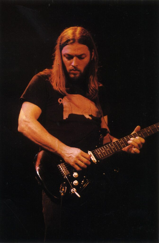 1977 David Gilmour playing guitar from the Animals Tour Book