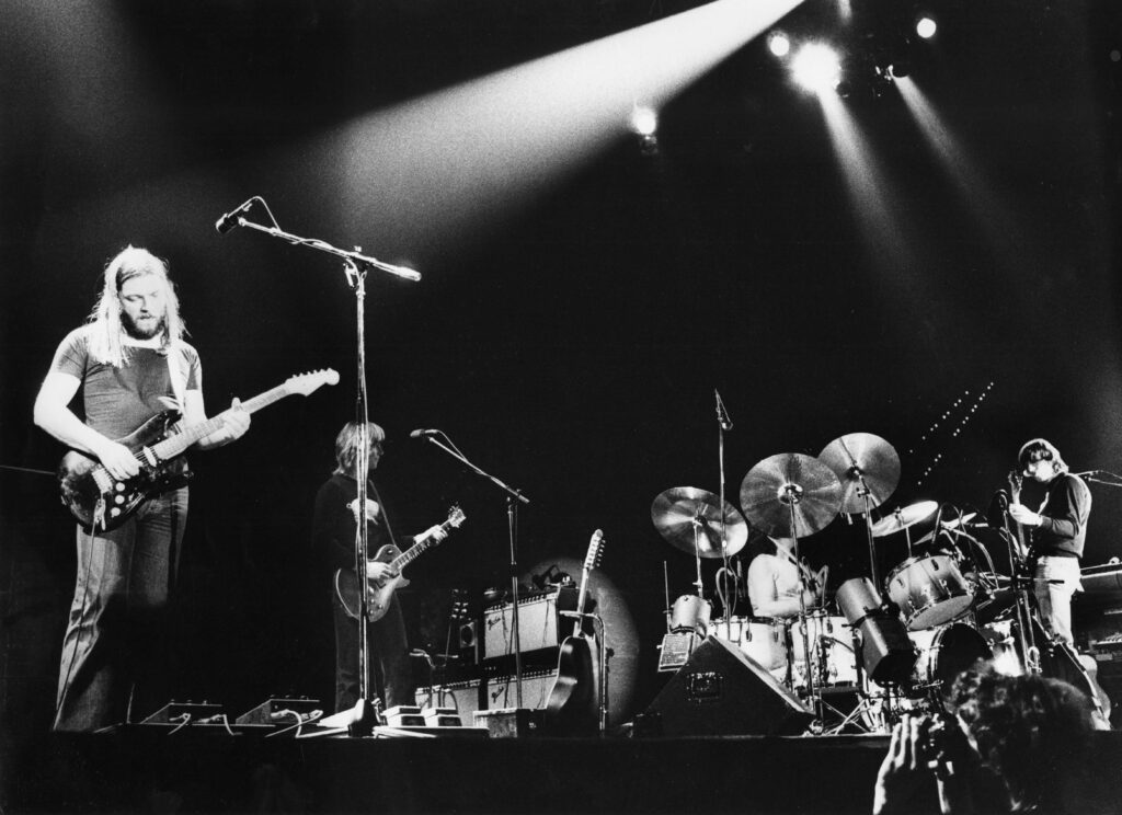 1977 Pink Floyd during their In The Flesh tour with Snowy White behind David Gilmour