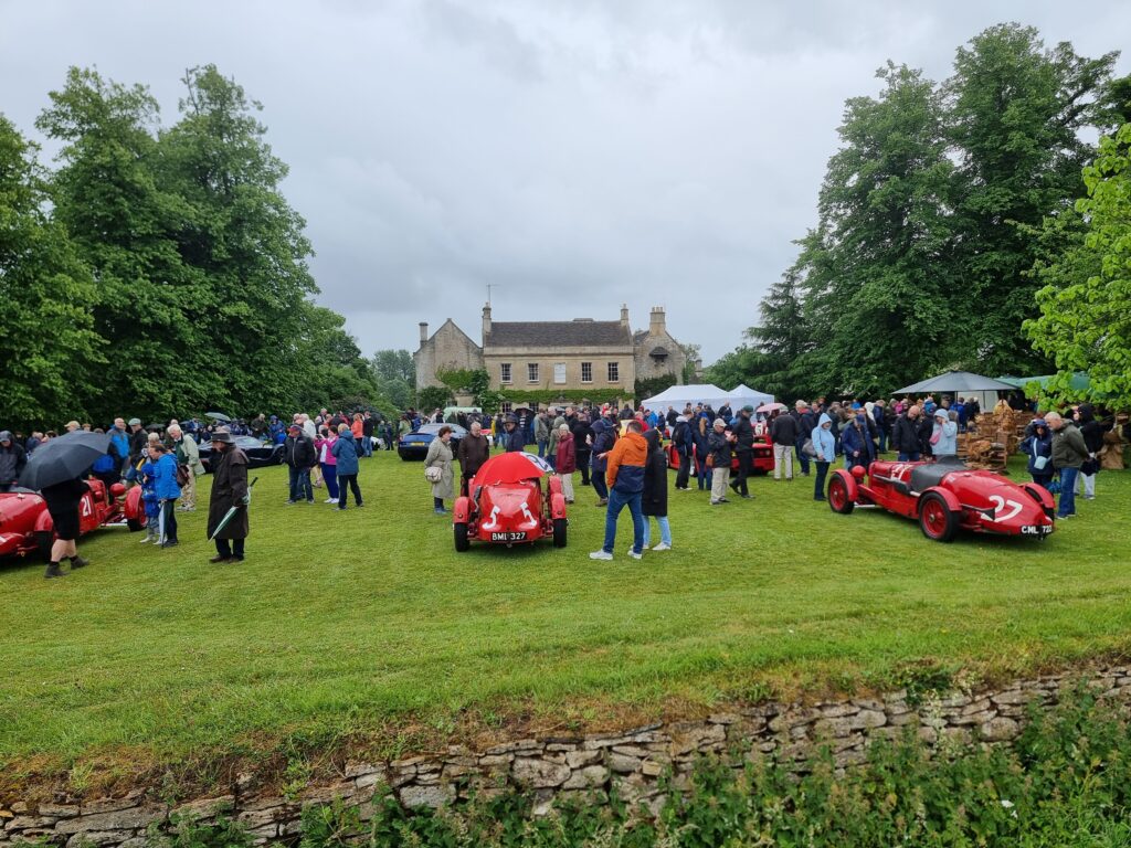 Nick's front lawn with cars
